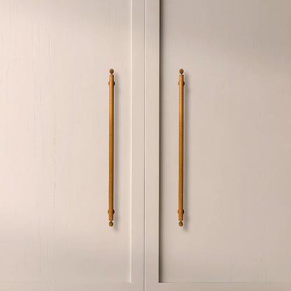The Mantara B-0122 Aureate Handle is a modern brass handle in bronze with a brushed finish, ideal for kitchens and dressers.
