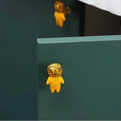 The Mantara CR-0001-Lion Knob is a modern yellow ceramic knob with a polished finish, ideal for wardrobes, cabinets, and kids&
