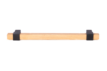 Mantara Lorien Handle W-0028 is a modern zinc and beech wood handle in  black ideal for kitchen and dresser drawers.