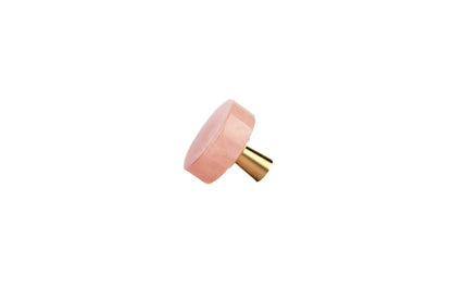 The Mantara C-0019 Lucienne Knob is a modern crystal knob in pink, perfect for drawers and cabinets.