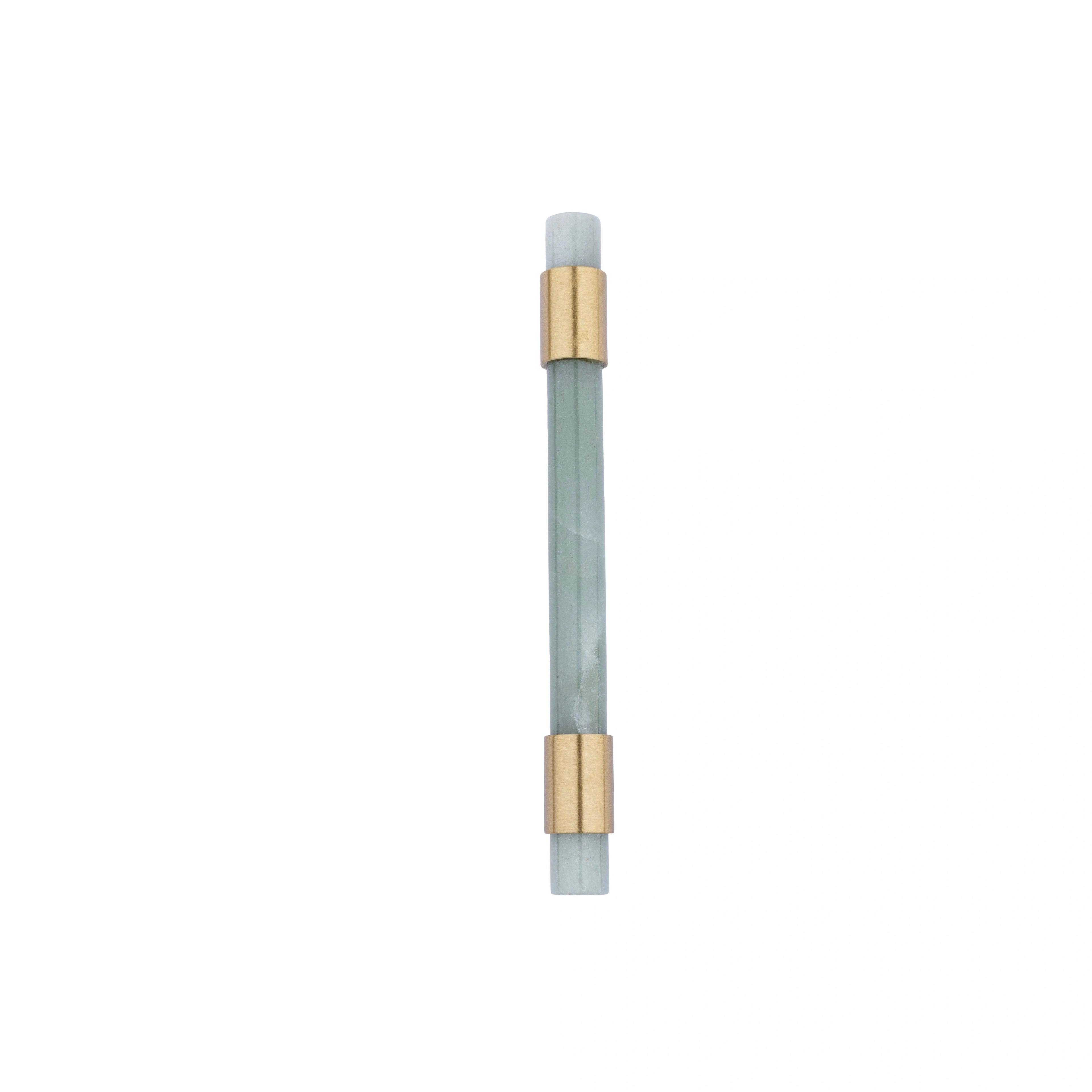 The Mantara C-0014-128 Luster Handle is a modern crystal and brass handle in green, ideal for wardrobes and doors.