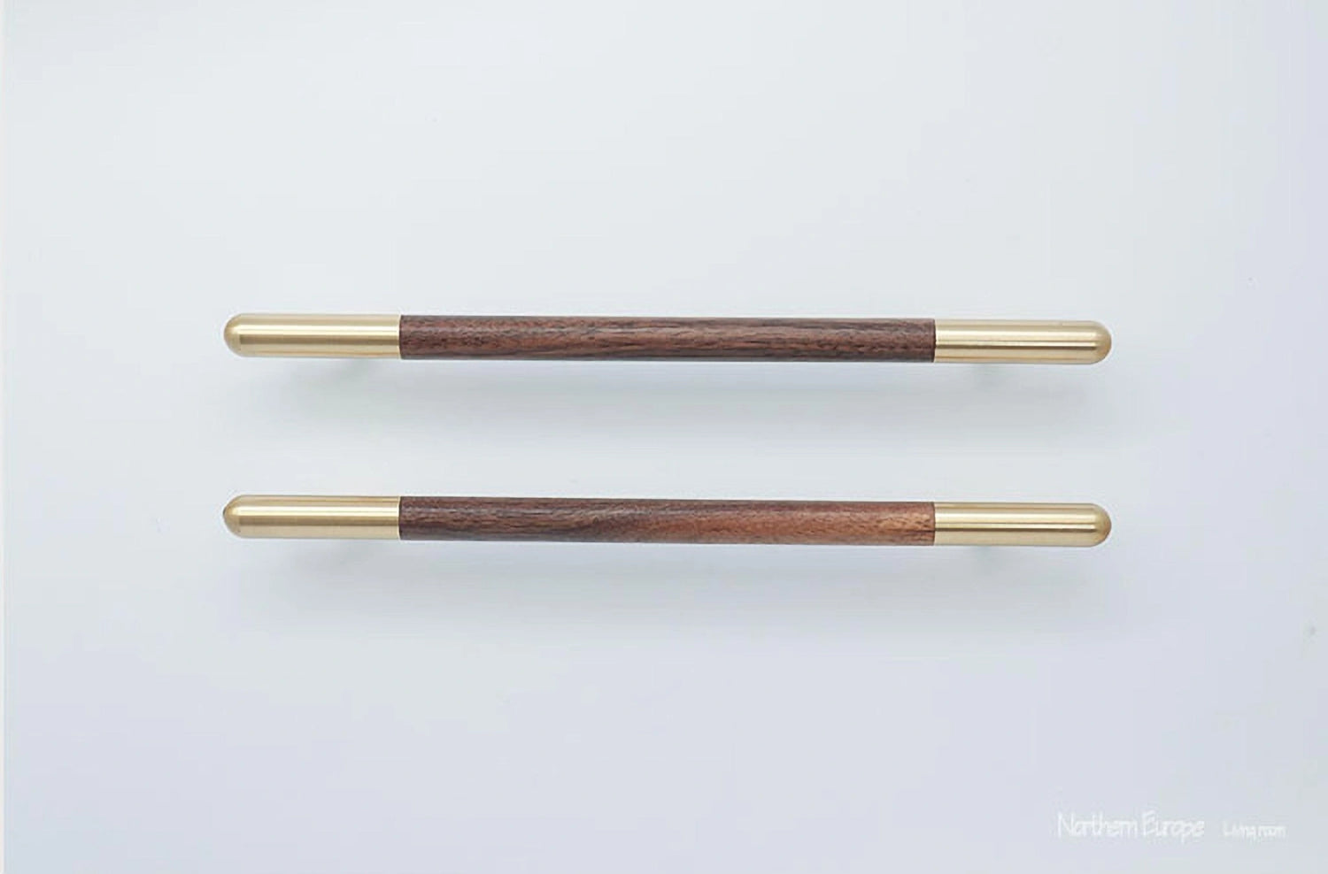 Mantara Mahogany Handle W-0003-H is a natural wood handle in brown with brushed brass finish, ideal for doors &amp; furniture.
