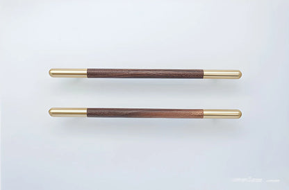Mantara Mahogany Handle W-0003-H is a natural wood handle in brown with brushed brass finish, ideal for doors &amp; furniture.