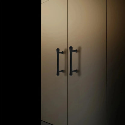 Mantara Raphael Handle B-0068 is a modern brushed brass handle in black, ideal for kitchens, drawers, and wardrobes.