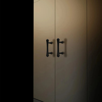 Mantara Raphael Handle B-0068 is a modern brushed brass handle in black, ideal for kitchens, drawers, and wardrobes.