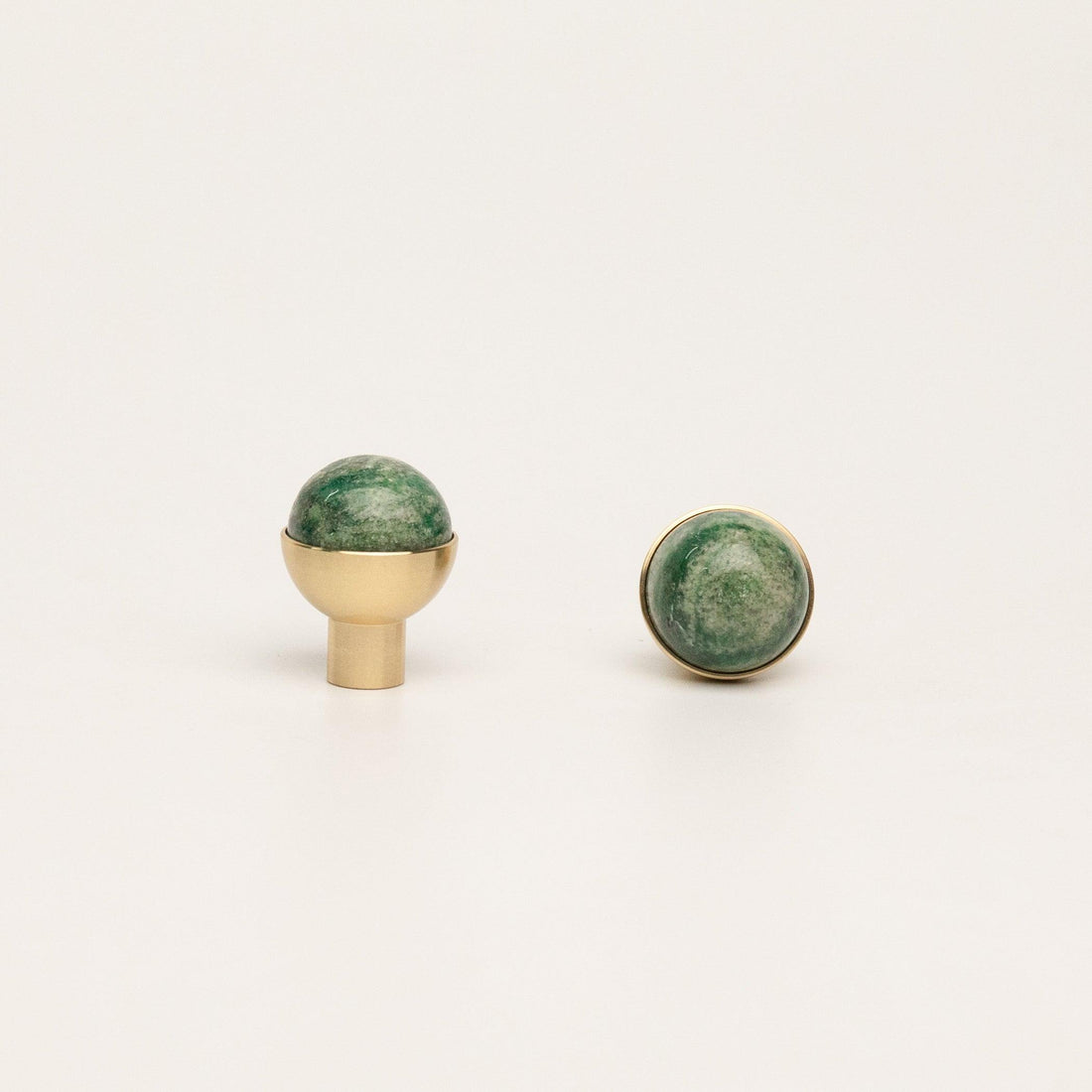 The Mantara C-0006 is a modern crystal + brass knob in green, white, blue &amp; black, ideal for drawers and cabinets.