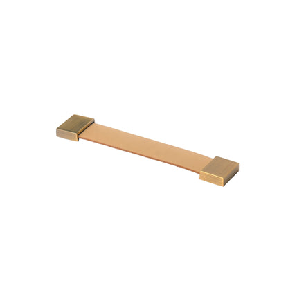 The Mantara L-0015 is a modern crystal handle in beige, ideal for kitchen drawers and dressers.