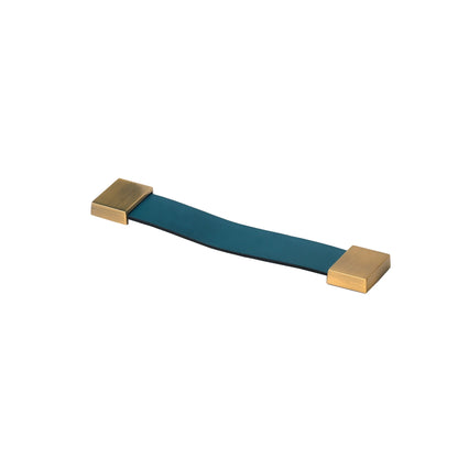 The Mantara L-0015 is a modern crystal handle in blue, ideal for kitchen drawers and dressers.