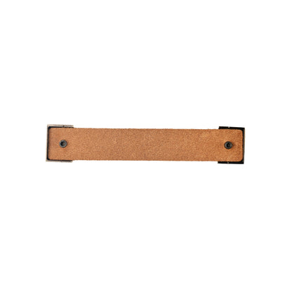 The Mantara L-0015 is a modern crystal handle in brown, ideal for kitchen drawers and dressers.