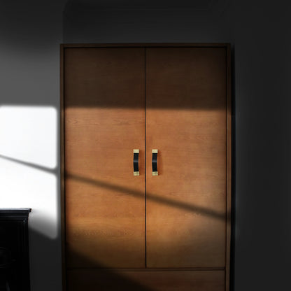 The Mantara L-0015 is a modern crystal handle in black, ideal for kitchen drawers and dressers.