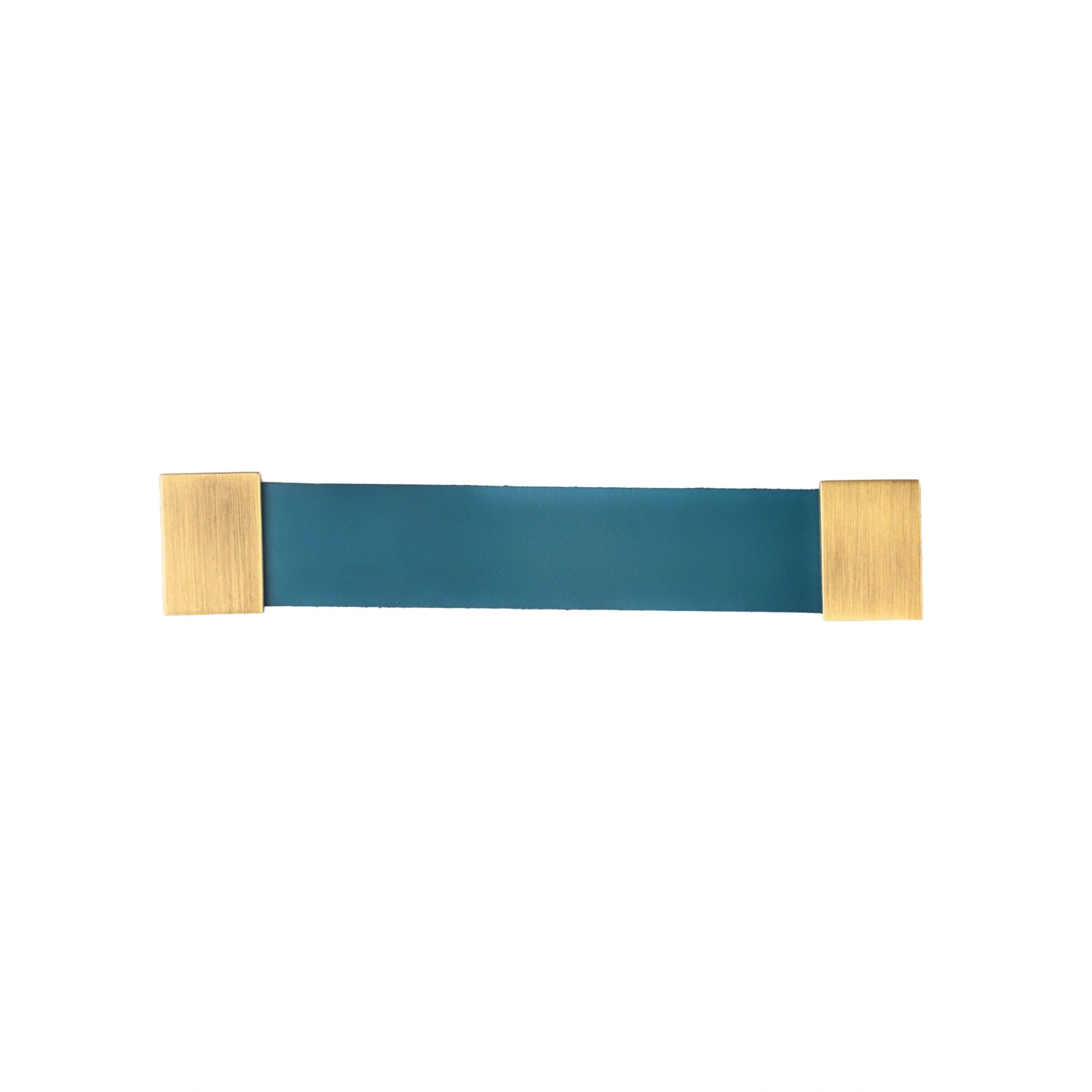 The Mantara L-0015 is a modern crystal handle in blue, ideal for kitchen drawers and dressers.