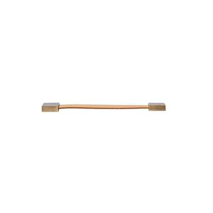 The Mantara L-0015 is a modern crystal handle in beige, ideal for kitchen drawers and dressers.