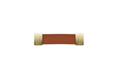 The Mantara L-0015 is a modern crystal handle in brown, ideal for kitchen drawers and dressers.
