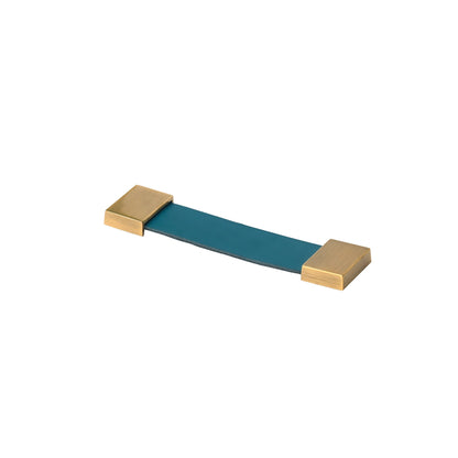 The Mantara L-0015 is a modern crystal handle in blue, ideal for kitchen drawers and dressers.