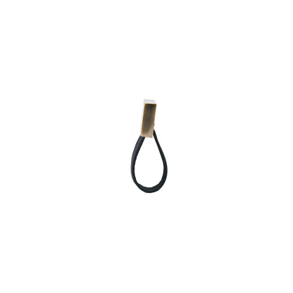 The Mantara L-0015 is a modern crystal handle in black, ideal for kitchen drawers and dressers.