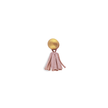 The Mantara L-0002 Maverick Drop Knob is a modern leather and brass knob in pink, ideal for kitchens and furniture.