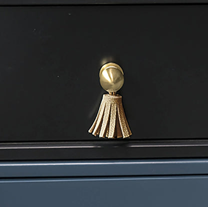 The Mantara L-0002 Maverick Drop Knob is a modern leather and brass knob in white, ideal for kitchens and furniture.