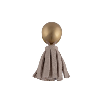 The Mantara L-0002 Maverick Drop Knob is a modern leather and brass knob in white, ideal for kitchens and furniture.