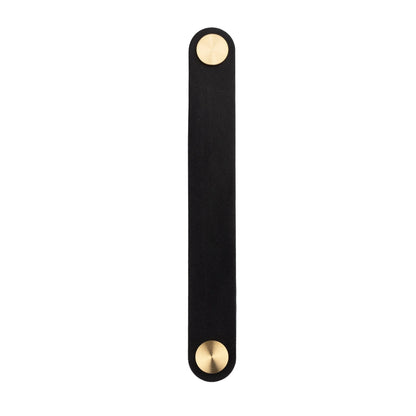 The Mantara L-0001-160 Maverick Handle is a Nordic leather and brass handle in black, ideal for kitchens and wardrobes.