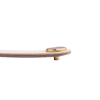 The Mantara L-0001-160 Maverick Handle is a Nordic leather and brass handle in white, ideal for kitchens and wardrobes.