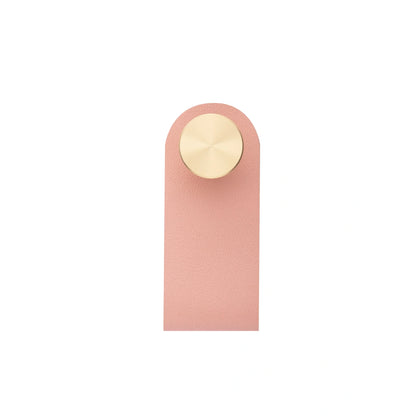 The Mantara L-0001 Maverick Pull Knob is a Nordic leather and brass knob in pink, ideal for kitchens and furniture.