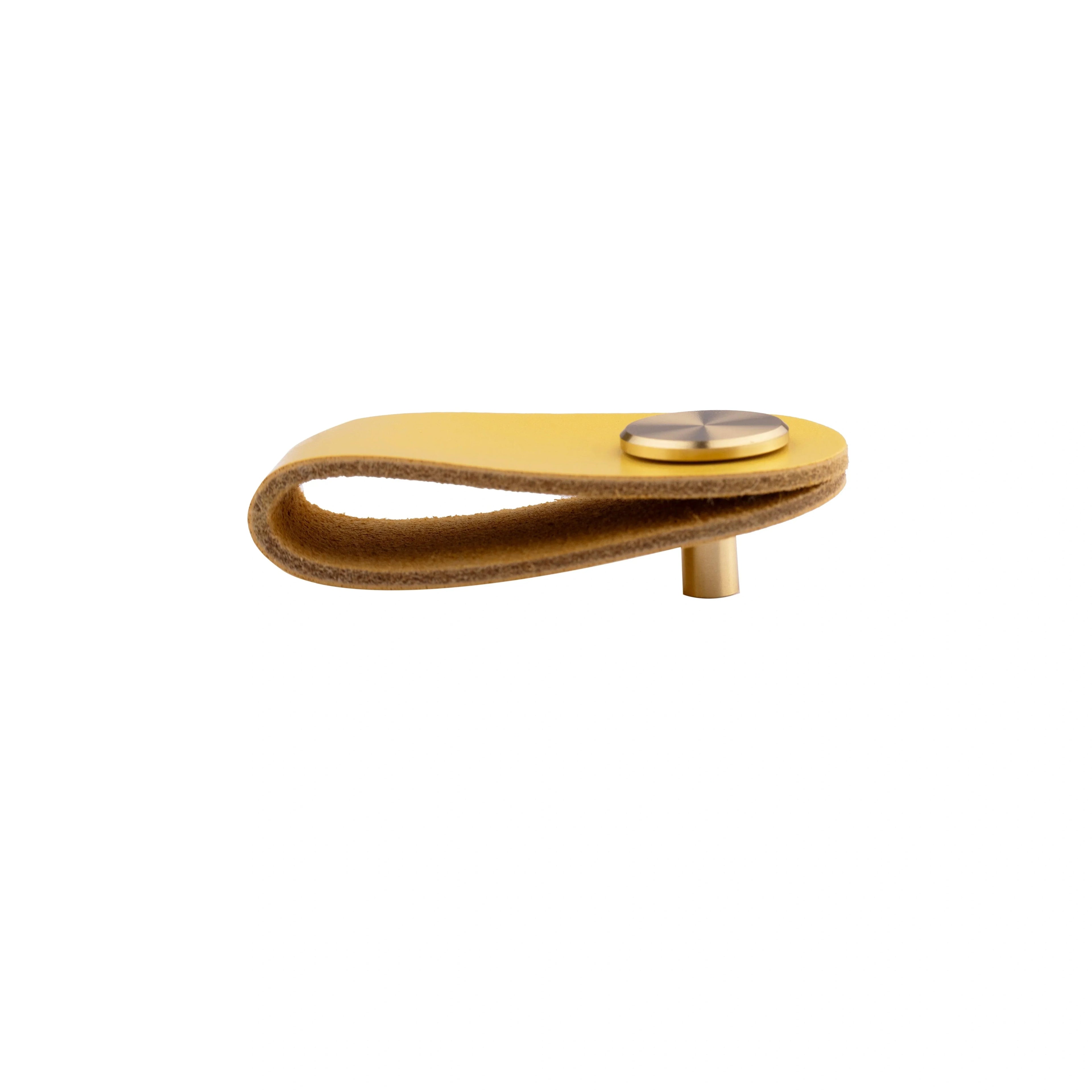 The Mantara L-0001 Maverick Pull Knob is a Nordic leather and brass knob in yellow, ideal for kitchens and furniture.