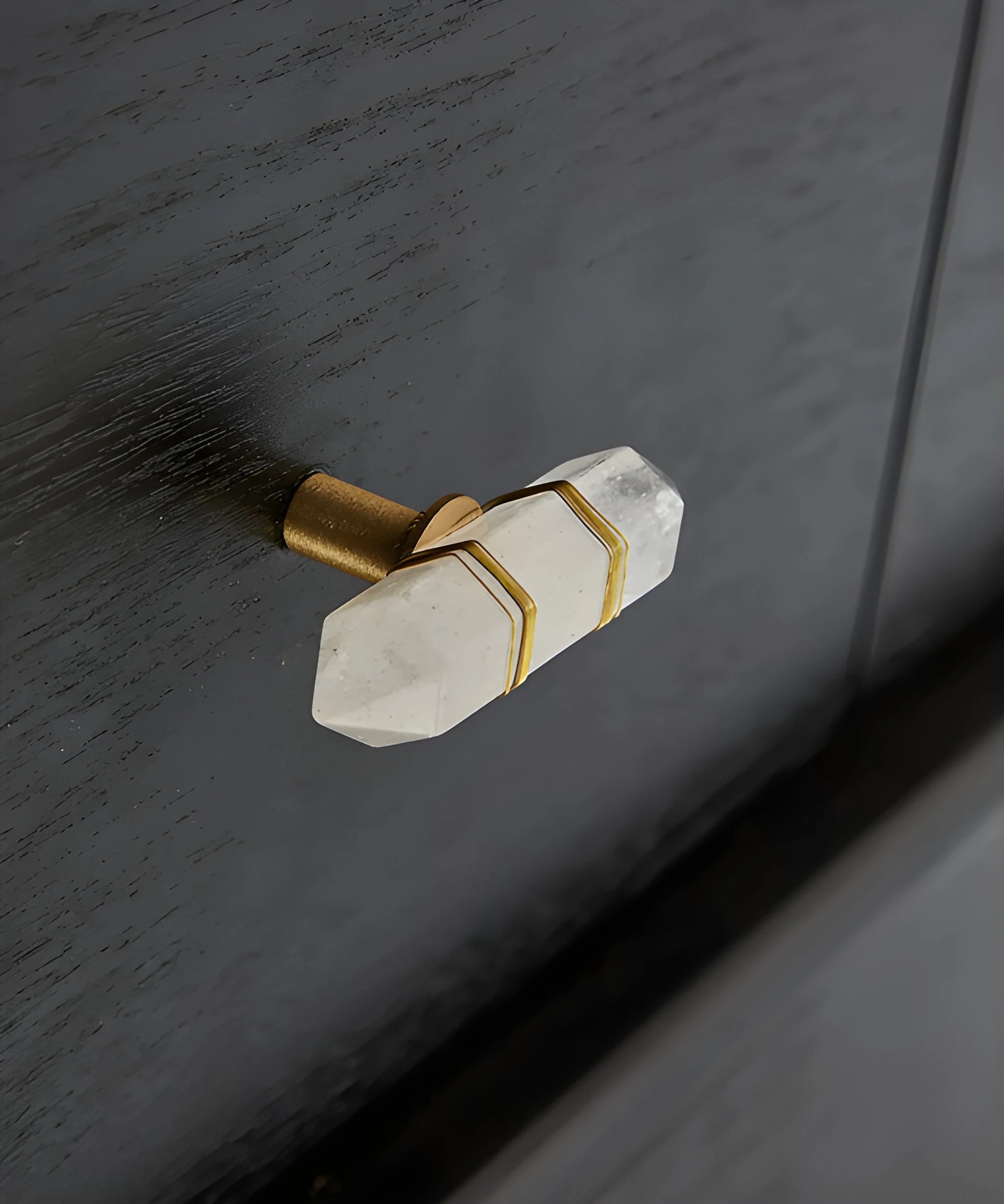 The Mantara C-0013 Mystic Handle is a modern crystal and brass knob in pink, ideal for drawers and cabinets.
