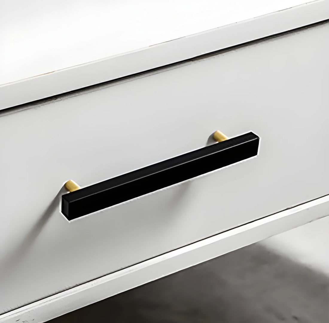 Mantara Noir Handle M-0012 is a modern marble & brass handle in black, ideal for kitchen, drawers & cabinets.