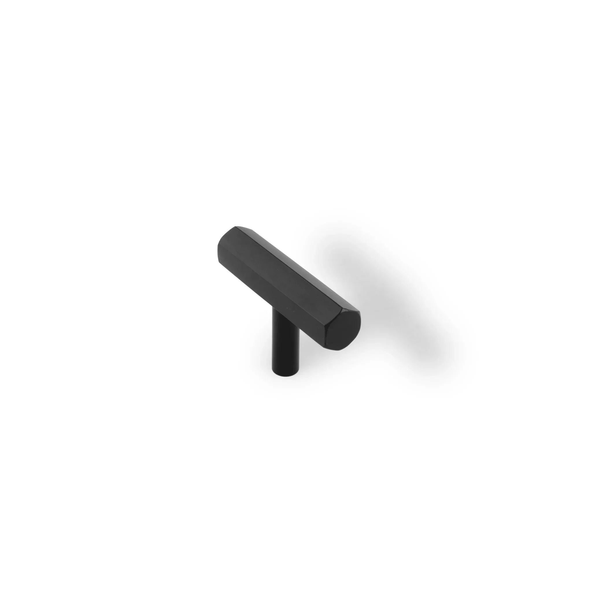 The Mantara B-0052 Oblivion T-Bar Handle is a modern solid brass handle in matte black, gold, and bronze, ideal for cabinets, kitchens, bedrooms, and drawers.