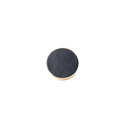The Mantara L-0004-DIS Obsidian Knob is a modern brass and leather knob in black, ideal for wardrobes, kitchens, and cabinets.
