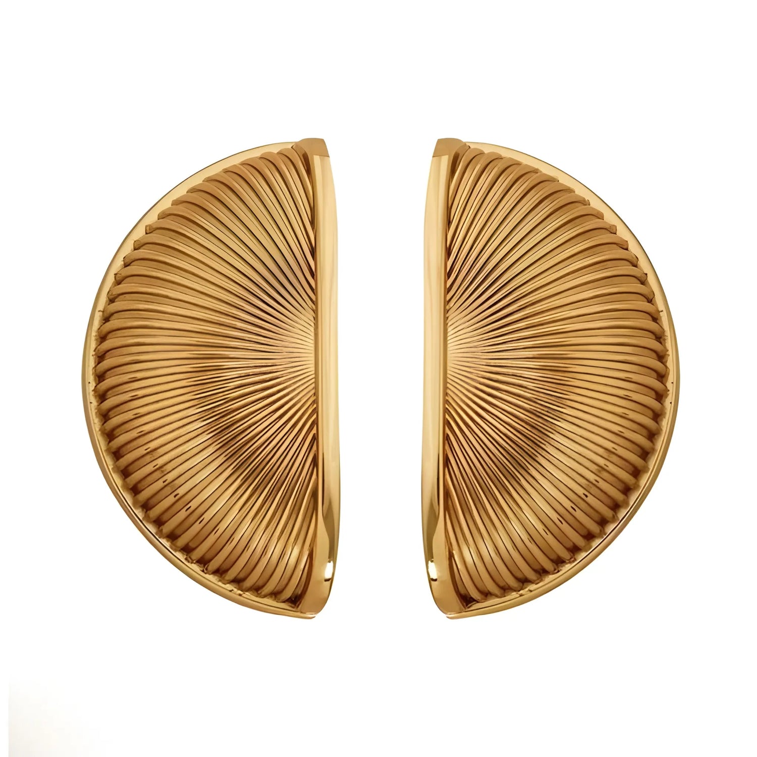 The Odette Handle by Mantara B-0107 is a polished brass handle in gold, perfect for drawers, cupboards, and kitchens.