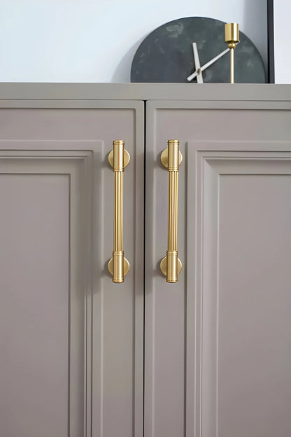 Mantara Olympus Handle B-0098 is a modern solid brass handle in brushed gold, perfect for wardrobes, kitchens, and cabinets.