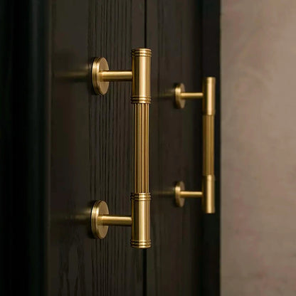 Mantara Olympus Handle B-0098 is a modern solid brass handle in brushed gold, perfect for wardrobes, kitchens, and cabinets.