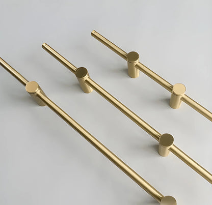 Mantara Marula Handle SKU B-0081 is a modern solid brass handle in polished gold for wardrobes and cabinets.