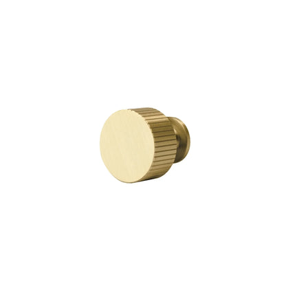 The Mantara B-0051 Oro Knob is a modern brass knob in polished gold and bronze, perfect for doors, drawers, and cabinets.