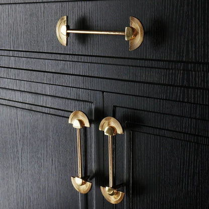 Mantara Palm Knob B-0085 is a modern polished brass knob in gold, perfect for doors, cabinets, and wardrobes.
