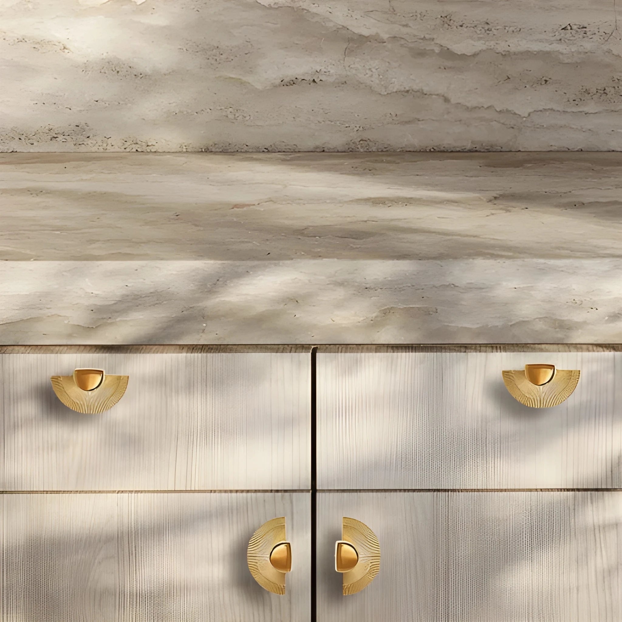 Mantara Palm Knob B-0085 is a modern polished brass knob in gold, perfect for doors, cabinets, and wardrobes.