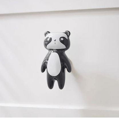 The Mantara CR-0001-Panda Knob is a modern black ceramic knob with a polished finish, perfect for wardrobes, drawers, cabinets, and kids&