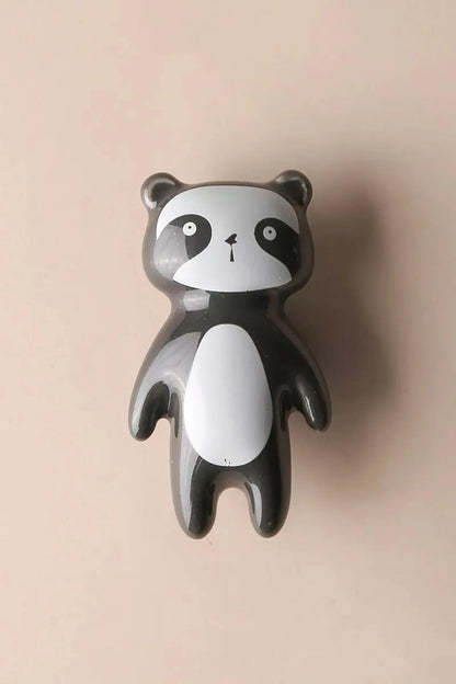 The Mantara CR-0001-Panda Knob is a modern black ceramic knob with a polished finish, perfect for wardrobes, drawers, cabinets, and kids&