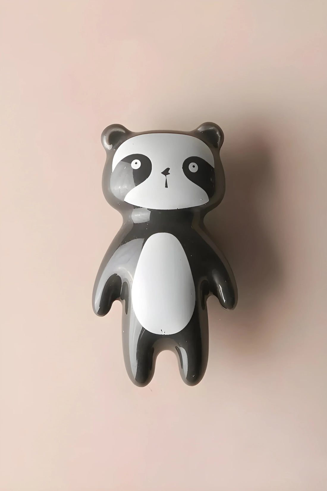 The Mantara CR-0001-Panda Knob is a modern black ceramic knob with a polished finish, perfect for wardrobes, drawers, cabinets, and kids&