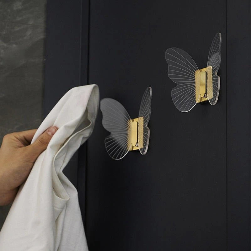 Mantara Papillon Hook Z-0031 is a modern white hook made of zinc alloy and acrylic with a matte finish, ideal for kitchen and dresser drawers.