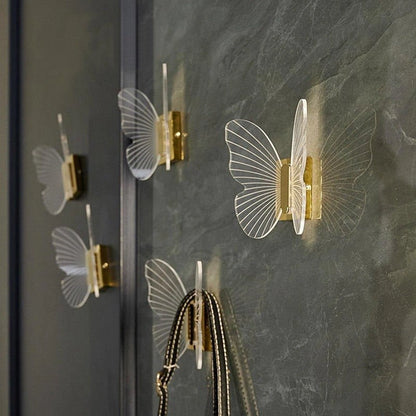 Mantara Papillon Hook Z-0031 is a modern white hook made of zinc alloy and acrylic with a matte finish, ideal for kitchen and dresser drawers.