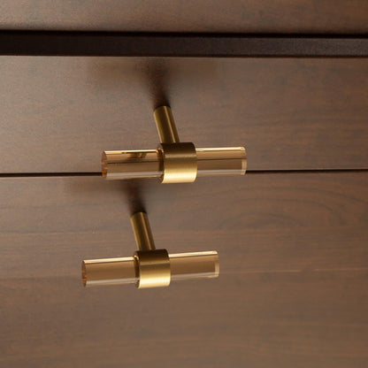 A stylish T-bar cabinet handle, Petra I made of clear acrylic and brushed brass in dark brown finish, model A-0007 by Mantara, A-0007.