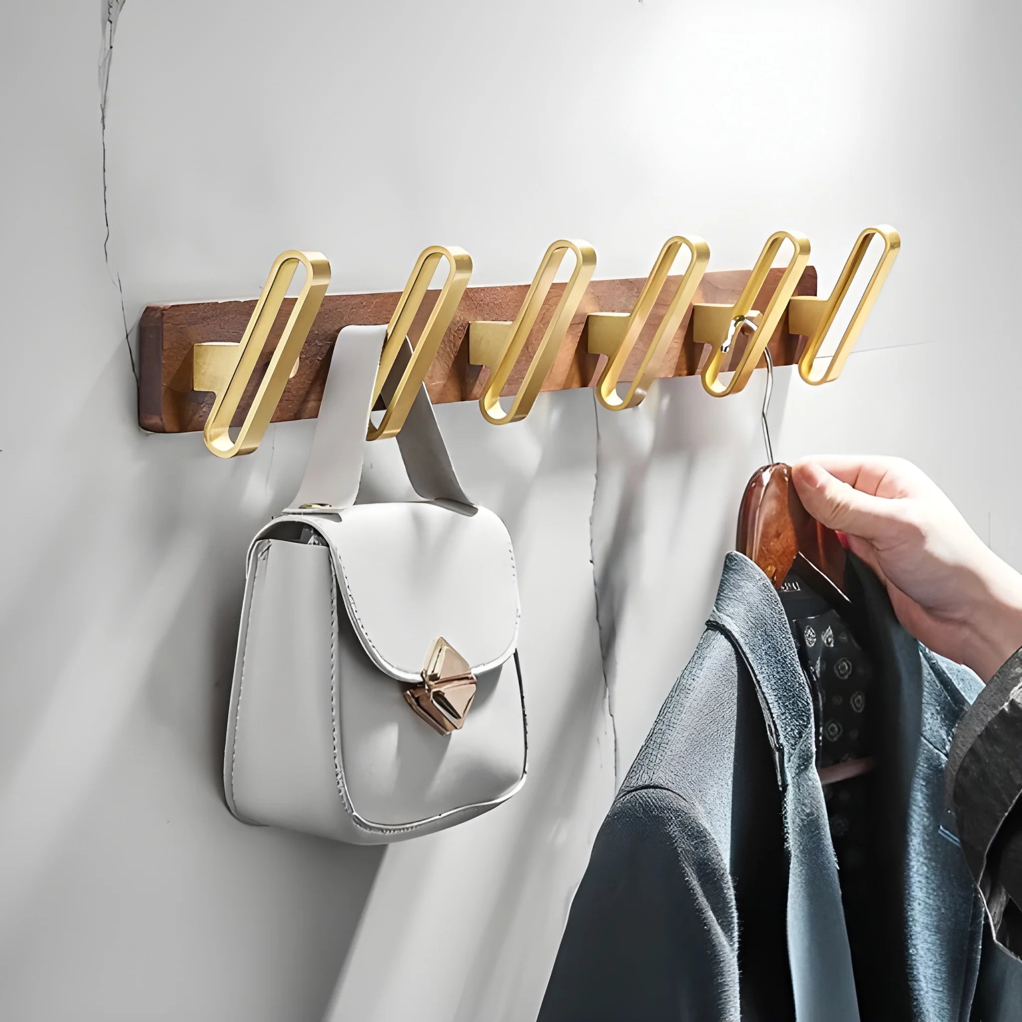 Mantara Plush Hook W-0012 is a modern walnut wood &amp; brass wall hook in gold with brushed finish, ideal for home,Bedrooms &amp; Bathrooms.