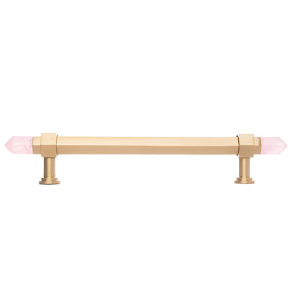 The Mantara C-0015 Quartz Handle is a modern brass and crystal handle in pink, ideal for doors, wardrobes, and cabinets.