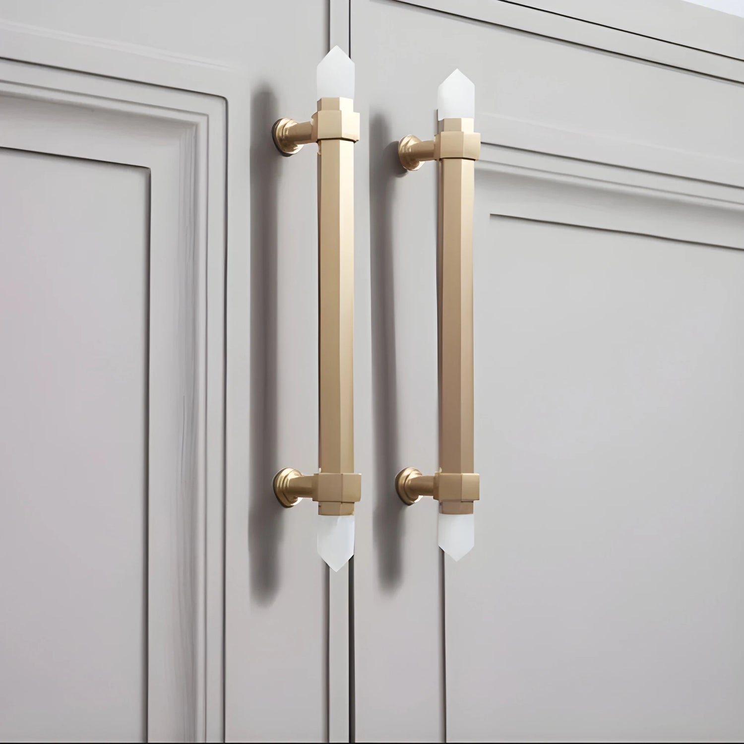 The Mantara C-0015 Quartz Handle is a modern brass and crystal handle in white, ideal for doors, wardrobes, and cabinets.