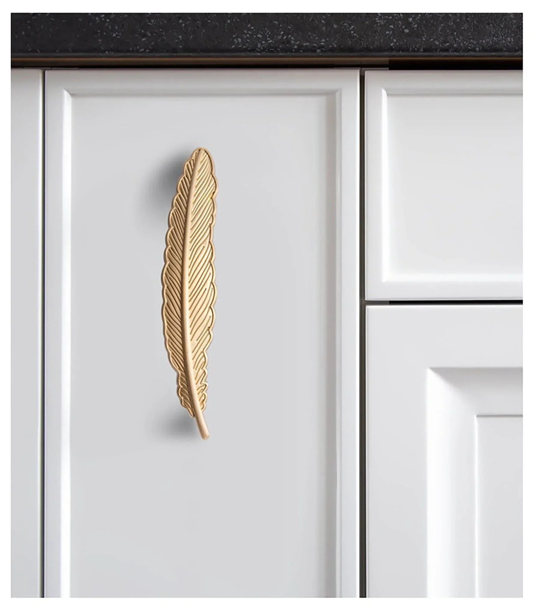 The Mantara B-0008 Quill Knob is a modern solid brass knob in brushed gold, available in left &amp; right designs for wardrobes, doors, and cabinets.