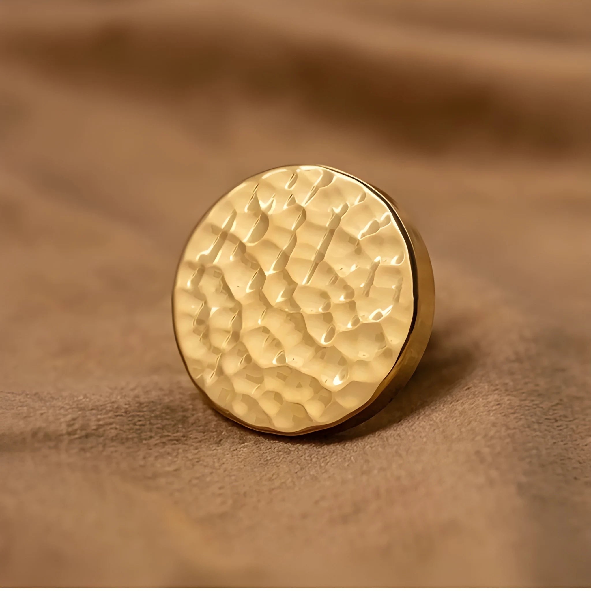 The Radiant Bloom Knob by Mantara B-0109 is a brushed brass round knob in gold, ideal for drawers, cabinets, and kitchens.