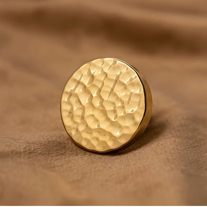 The Radiant Bloom Knob by Mantara B-0109 is a brushed brass round knob in gold, ideal for drawers, cabinets, and kitchens.