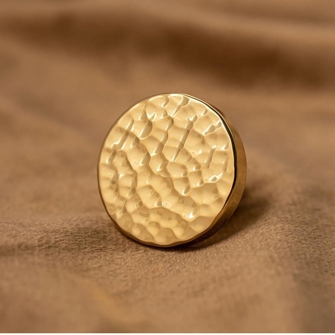 The Radiant Bloom Knob by Mantara B-0109 is a brushed brass round knob in gold, ideal for drawers, cabinets, and kitchens.